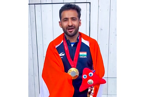 2024 Paris Paralympics: Para-badminton player Kumar Nitesh poses for photos after winning the gold medal in the men's singles SL3 badminton event